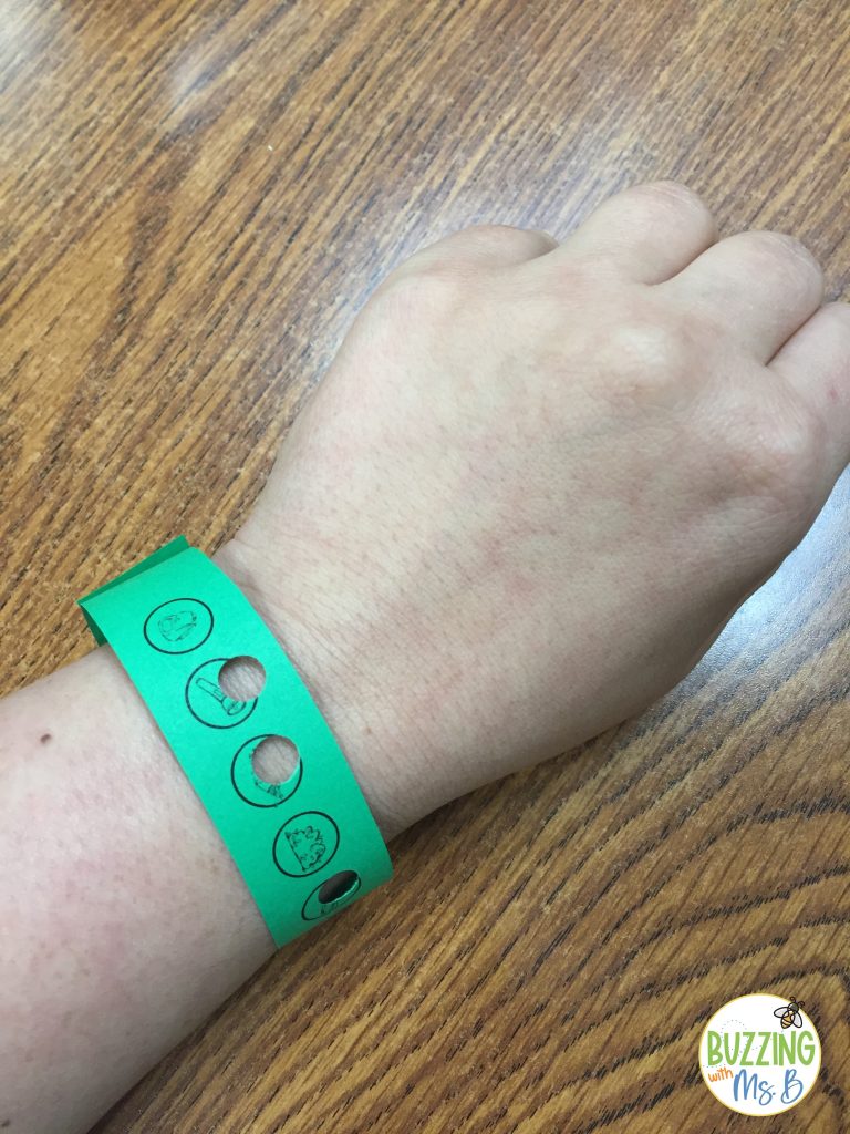 Punch bracelet for writing test prep stations